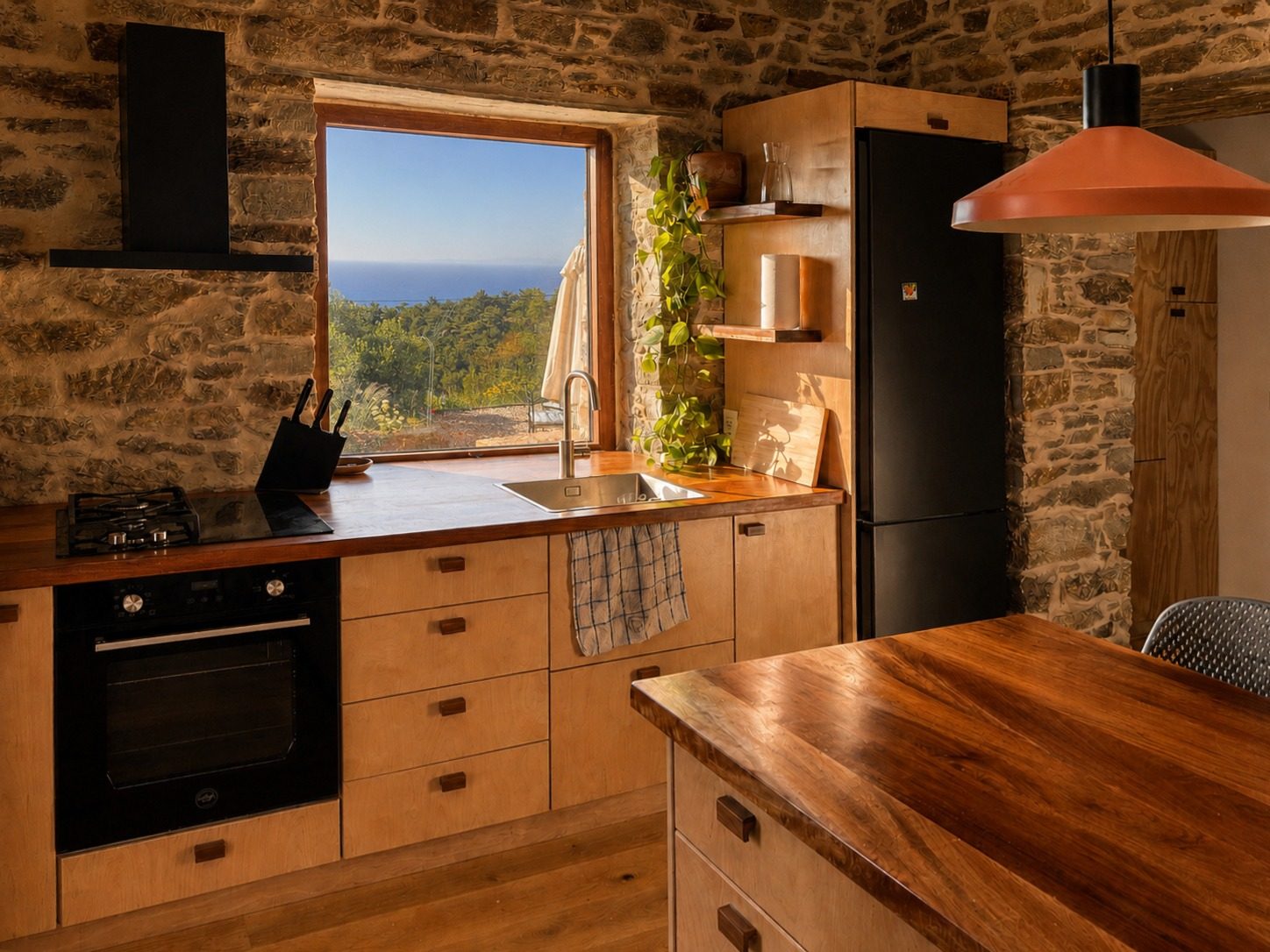 Kitchen with sea view through the window